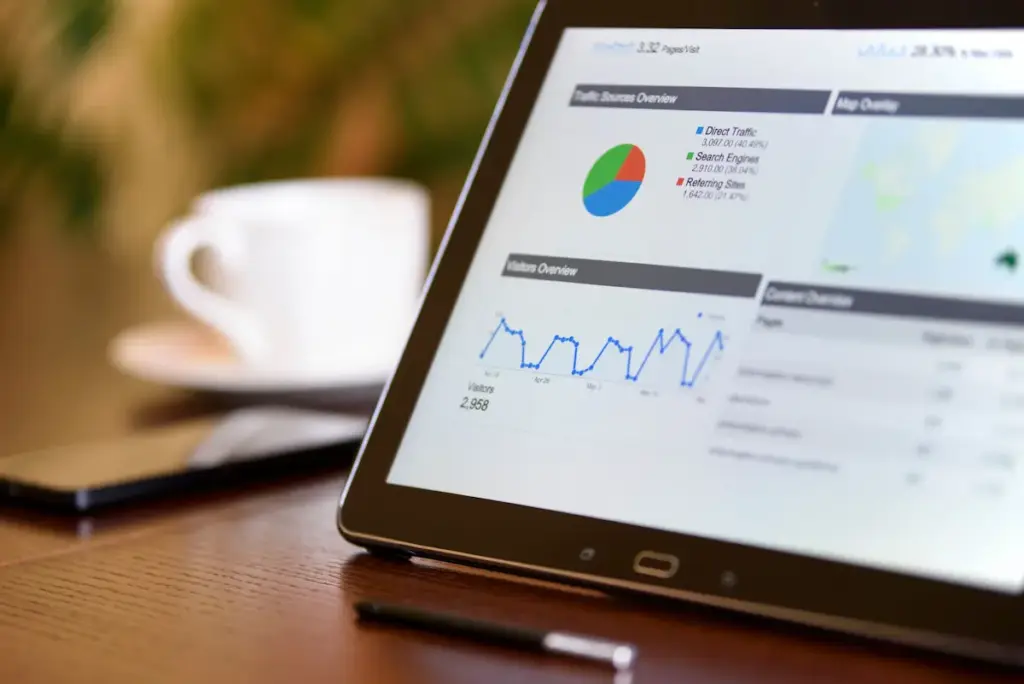 Digital marketing performance overview with pie chart displayed on tablet screen
