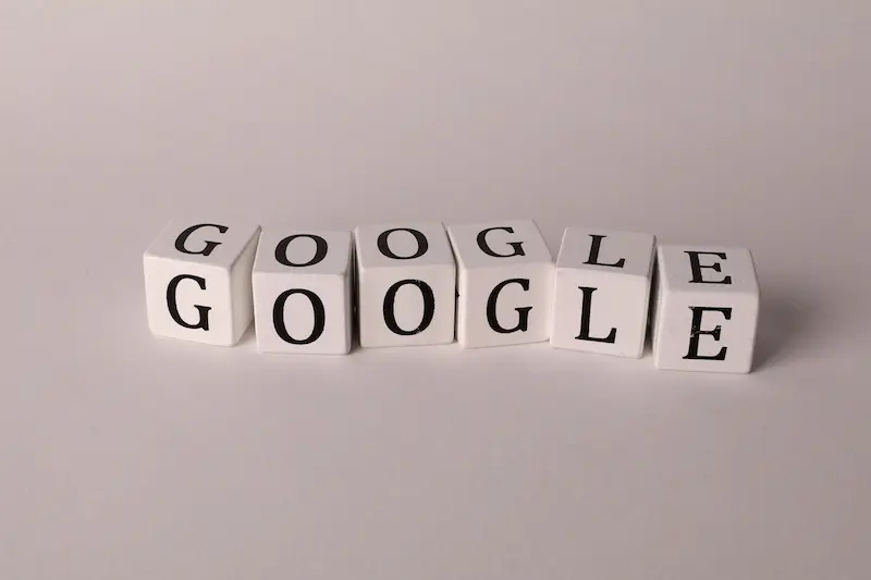 white block with letters spelling google