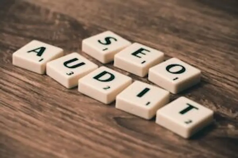 SEO audit for website optimization with letter tiles spelling SEO audit